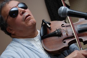 Hassan Erraji playing violin